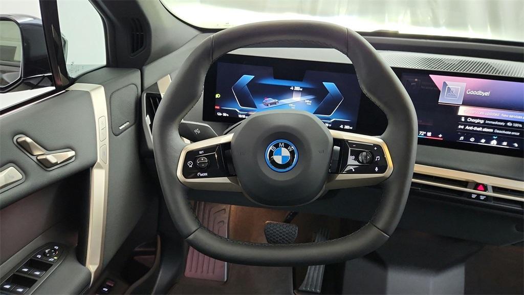 new 2025 BMW iX car, priced at $98,475