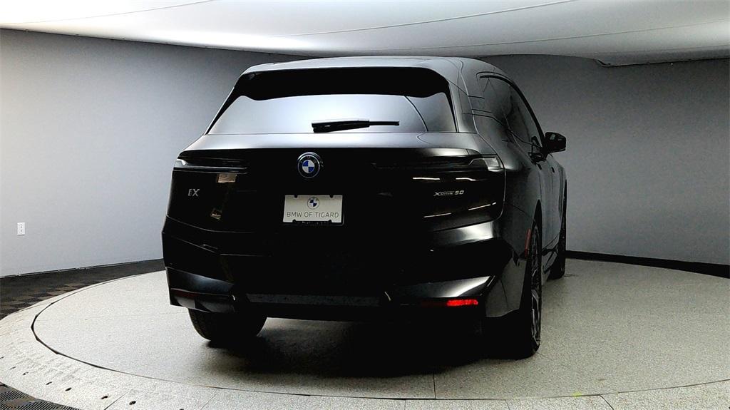 new 2025 BMW iX car, priced at $90,925