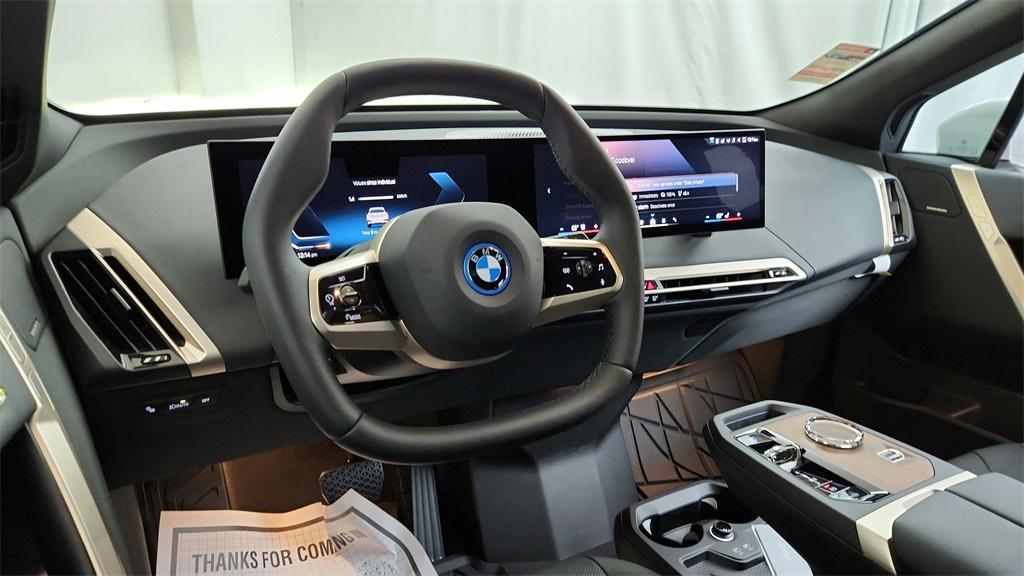 new 2025 BMW iX car, priced at $100,500