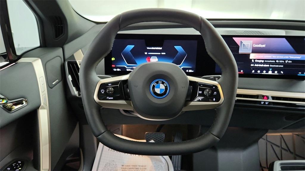 new 2025 BMW iX car, priced at $100,500