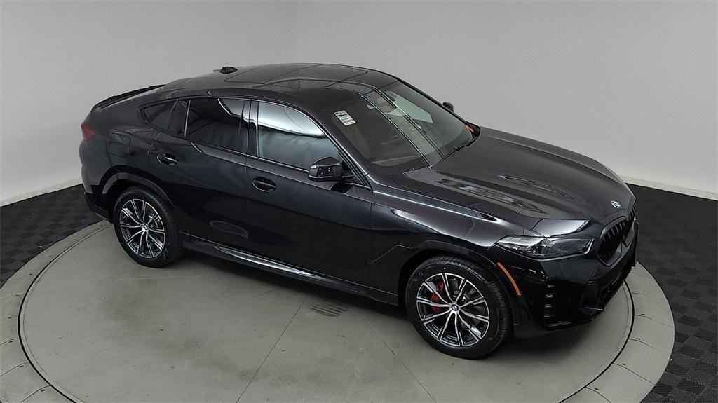 new 2025 BMW X6 car, priced at $86,535