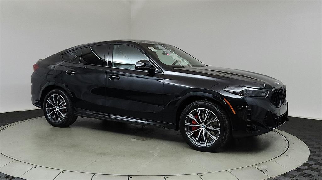 new 2025 BMW X6 car, priced at $86,535