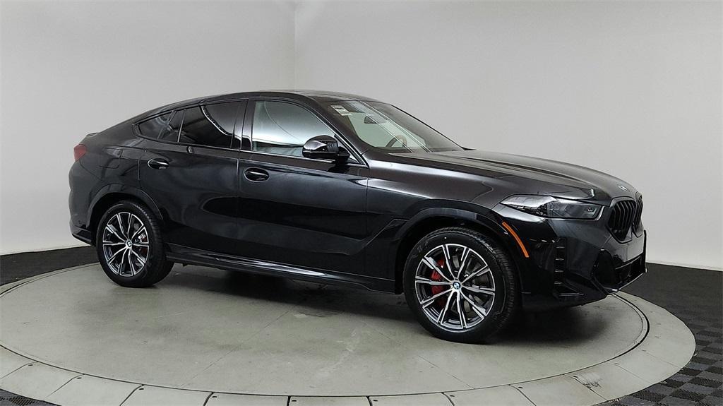 new 2025 BMW X6 car, priced at $86,535