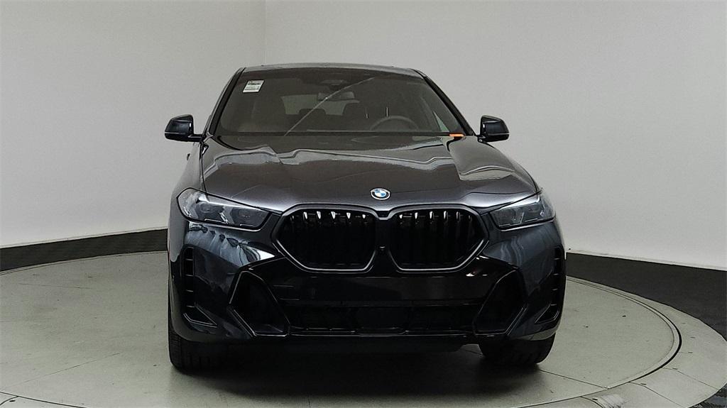 new 2025 BMW X6 car, priced at $86,535