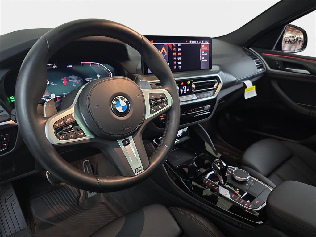 used 2025 BMW X4 car, priced at $52,980