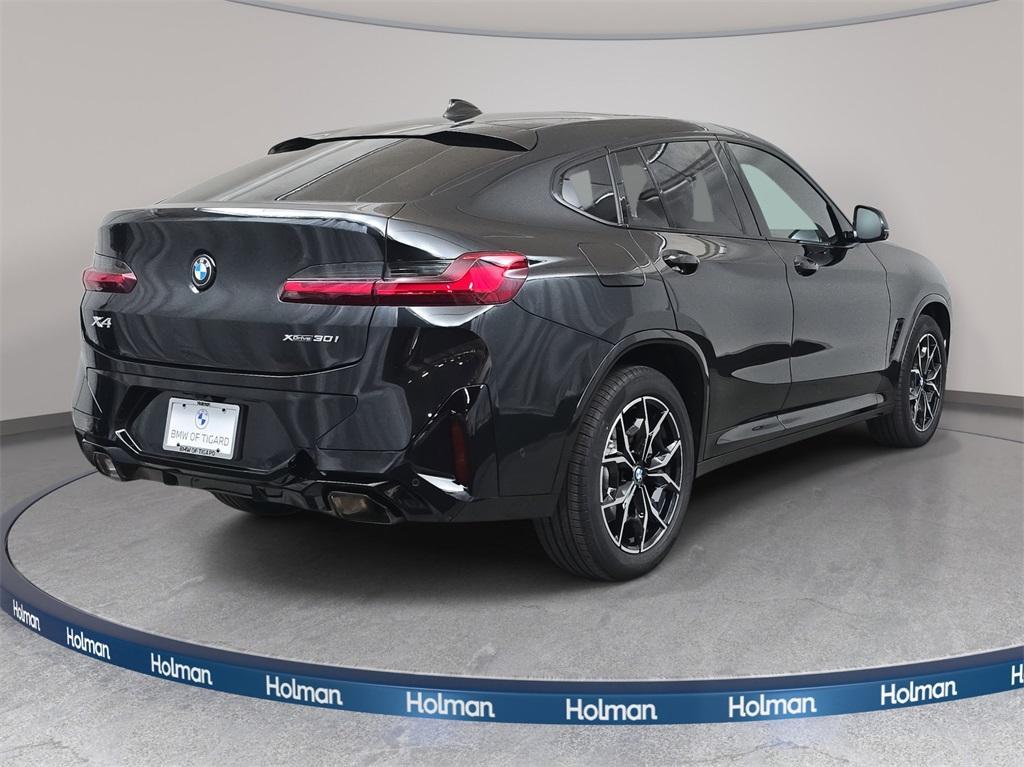 used 2025 BMW X4 car, priced at $52,980