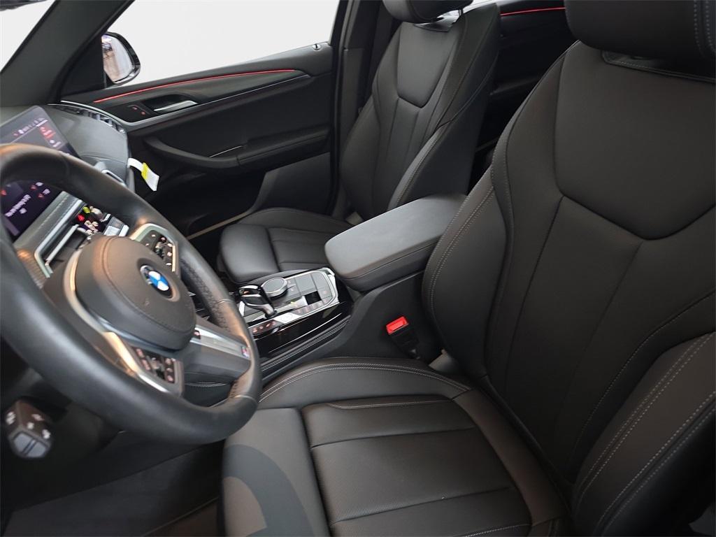 used 2025 BMW X4 car, priced at $52,980
