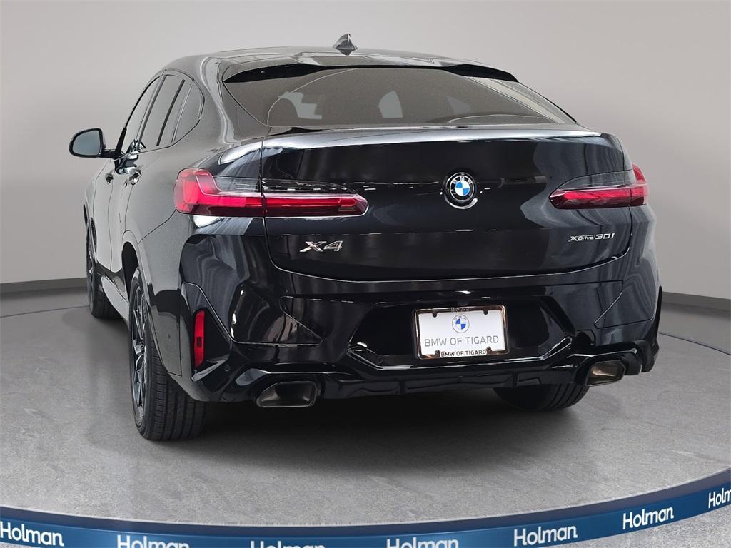 used 2025 BMW X4 car, priced at $52,980
