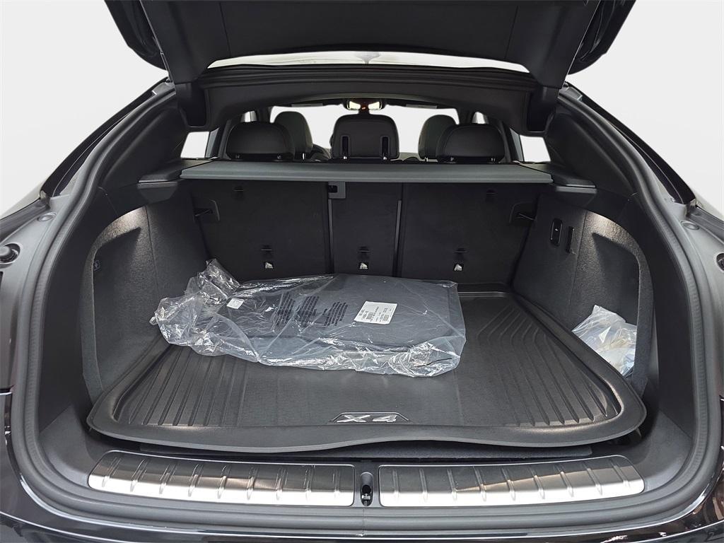used 2025 BMW X4 car, priced at $52,980