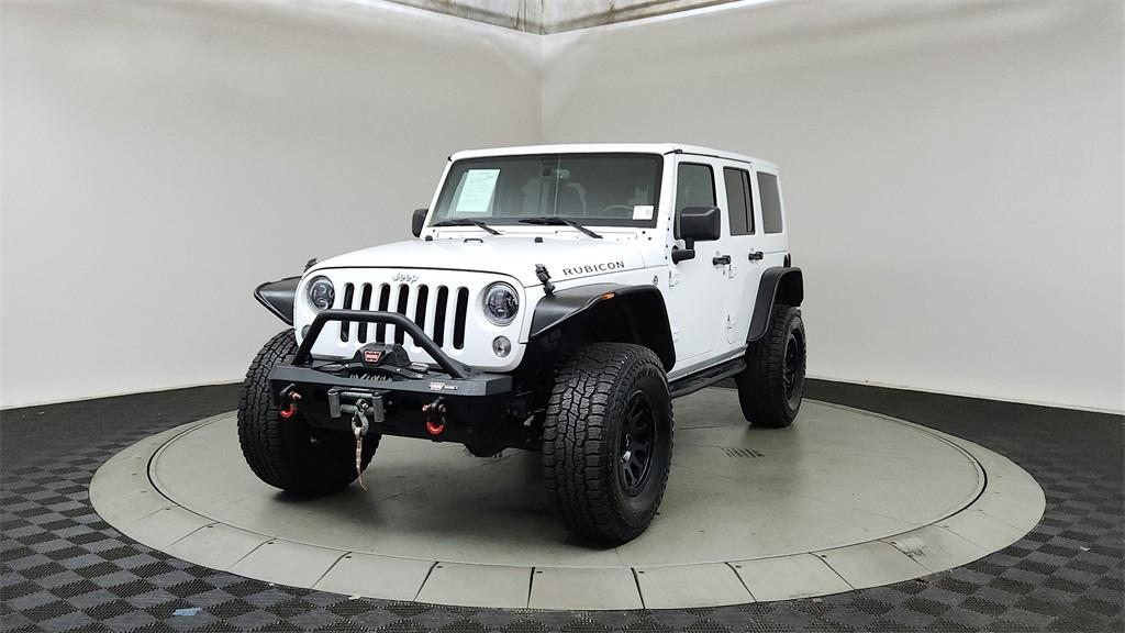 used 2016 Jeep Wrangler Unlimited car, priced at $23,990