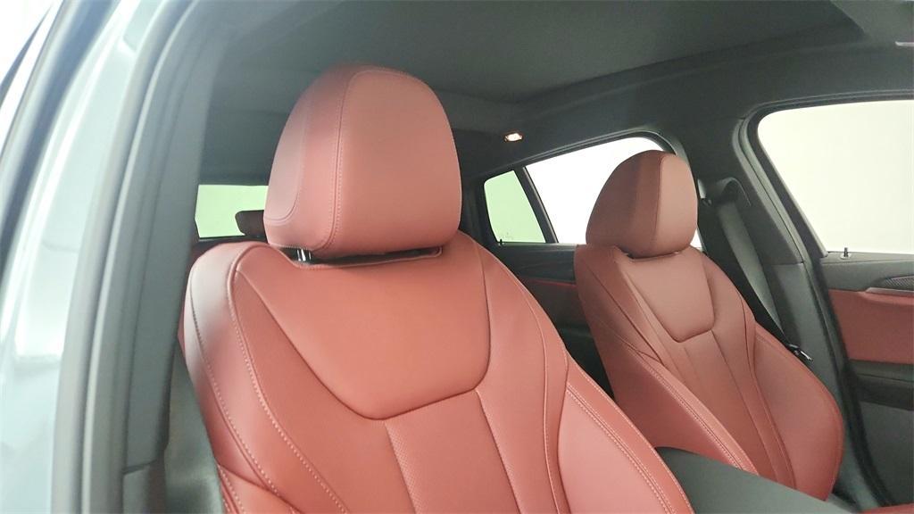 new 2025 BMW X4 car, priced at $75,330