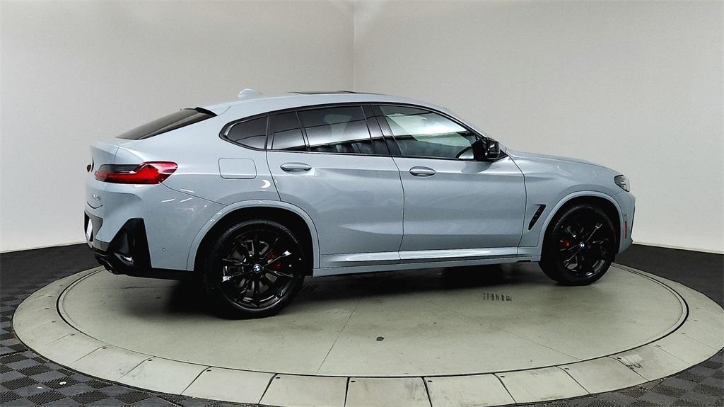 new 2025 BMW X4 car, priced at $75,330