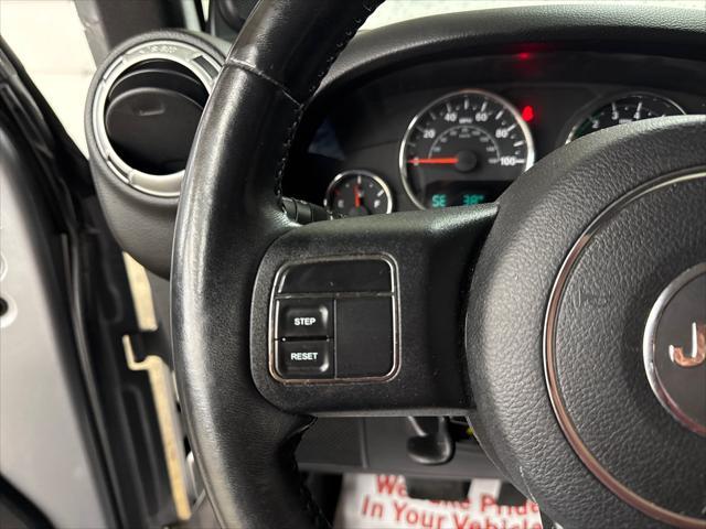 used 2014 Jeep Wrangler Unlimited car, priced at $20,495