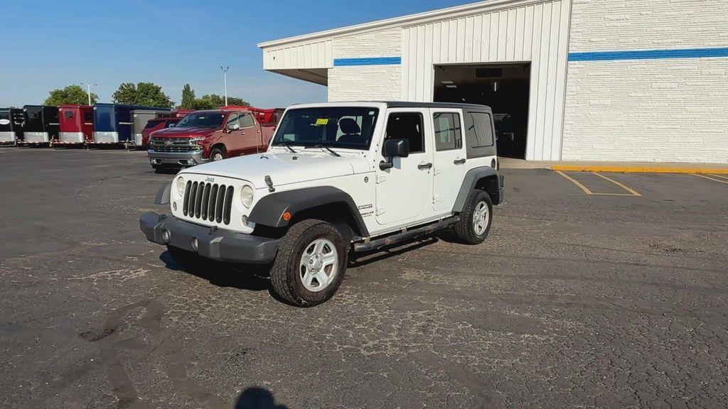 used 2014 Jeep Wrangler Unlimited car, priced at $13,995
