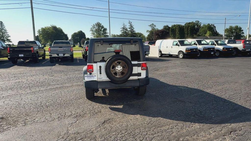 used 2014 Jeep Wrangler Unlimited car, priced at $13,995