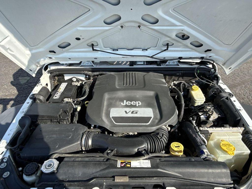 used 2014 Jeep Wrangler Unlimited car, priced at $13,995