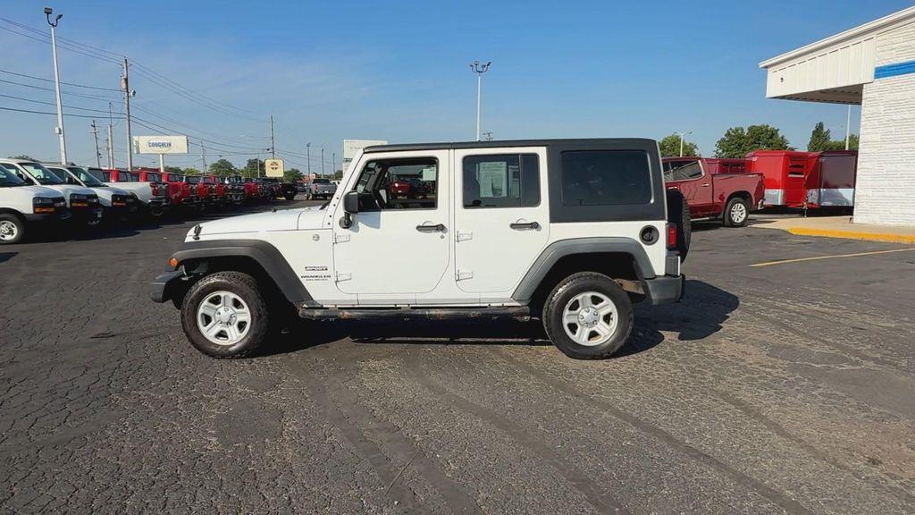 used 2014 Jeep Wrangler Unlimited car, priced at $13,995