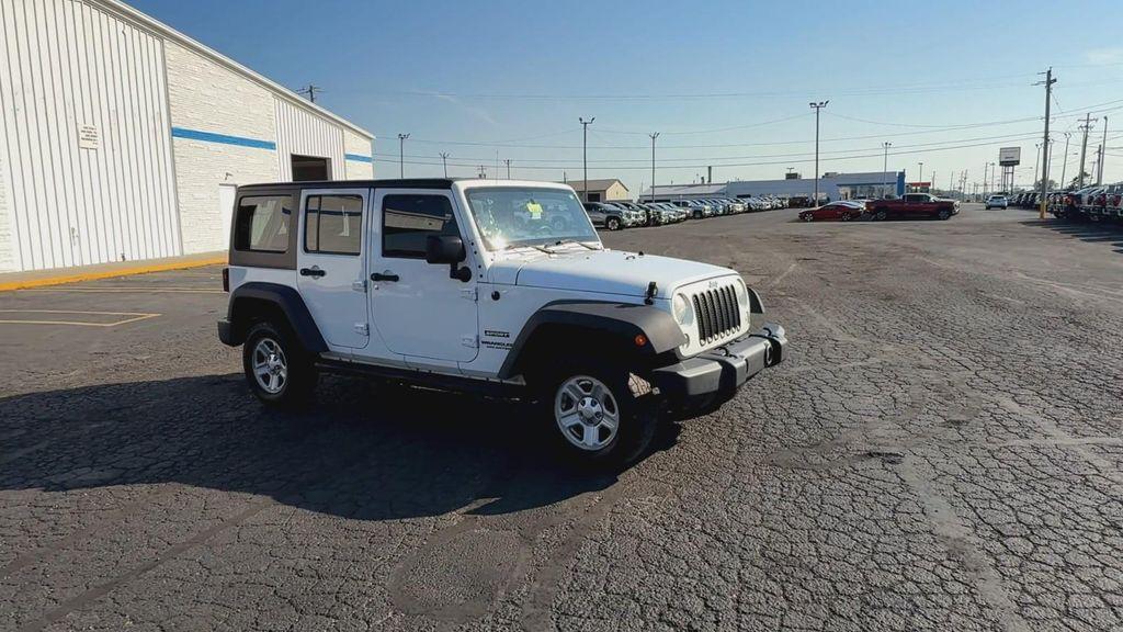 used 2014 Jeep Wrangler Unlimited car, priced at $13,995