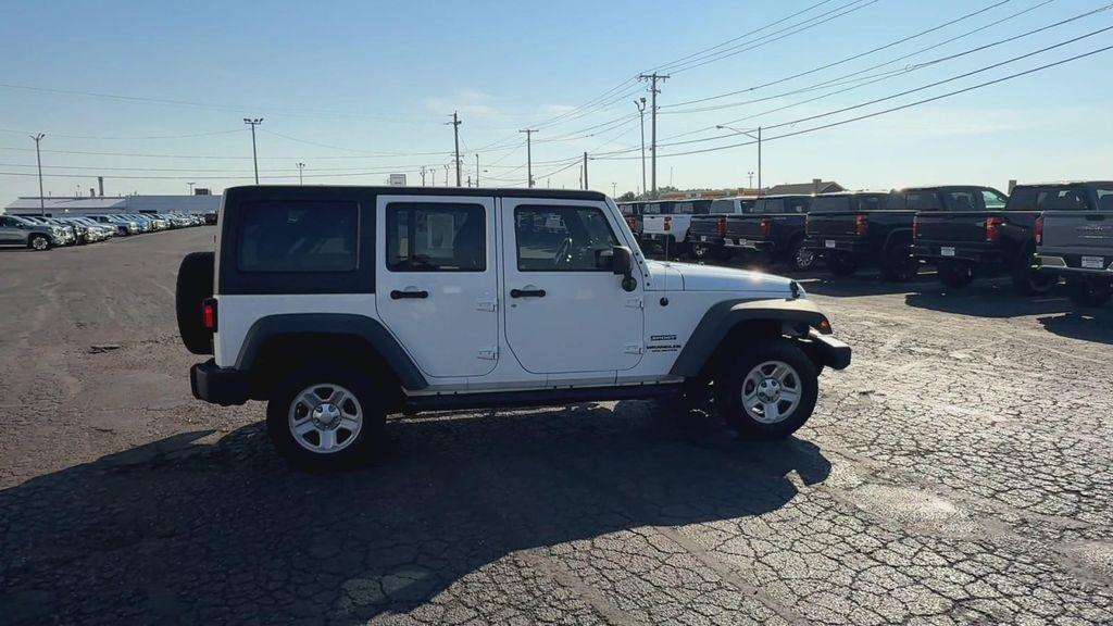 used 2014 Jeep Wrangler Unlimited car, priced at $13,995