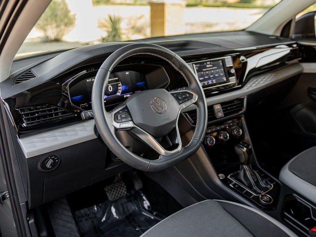 used 2023 Volkswagen Taos car, priced at $18,996