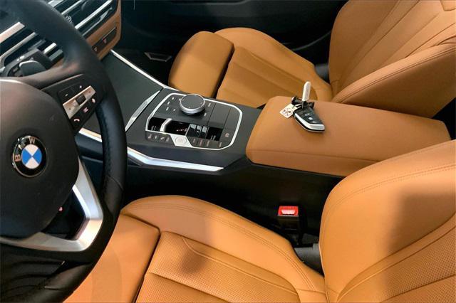 used 2024 BMW 330 car, priced at $50,585
