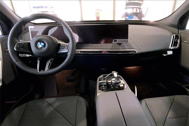 new 2025 BMW iX car, priced at $100,325