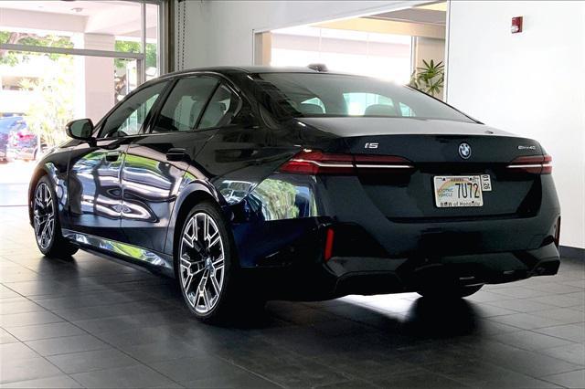 used 2024 BMW i5 car, priced at $77,095