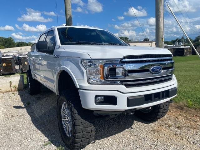 used 2018 Ford F-150 car, priced at $26,619