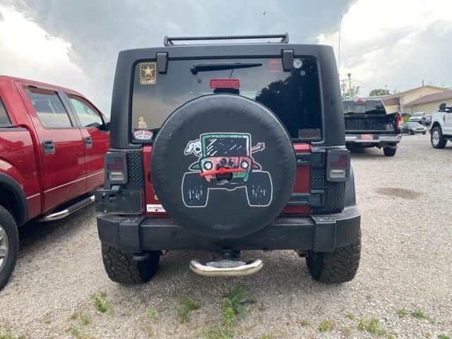 used 2012 Jeep Wrangler Unlimited car, priced at $14,819