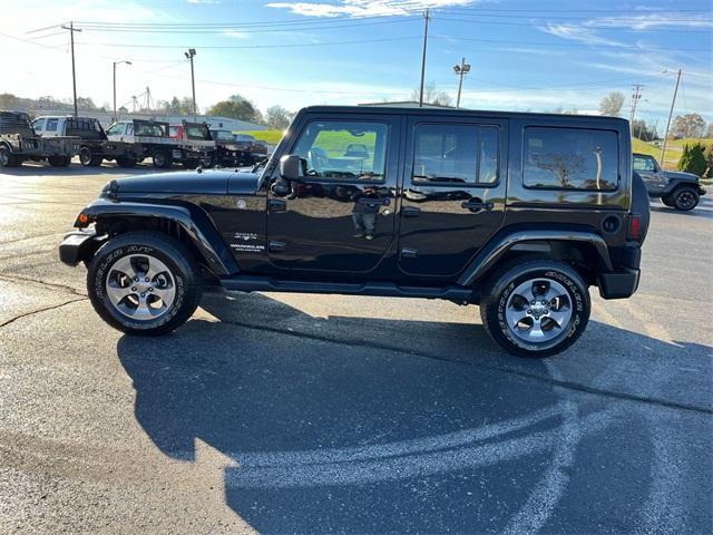 used 2017 Jeep Wrangler Unlimited car, priced at $26,611