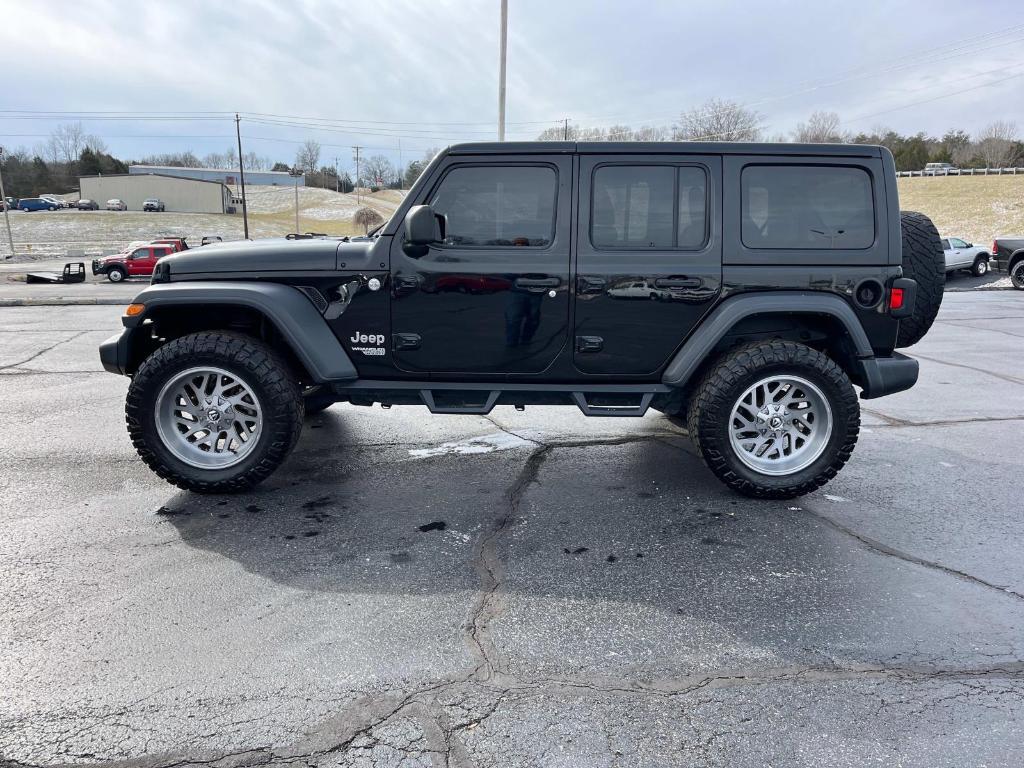 used 2018 Jeep Wrangler Unlimited car, priced at $23,358