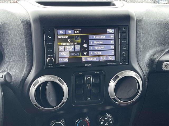 used 2015 Jeep Wrangler Unlimited car, priced at $22,576