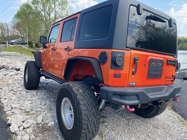 used 2015 Jeep Wrangler Unlimited car, priced at $23,405
