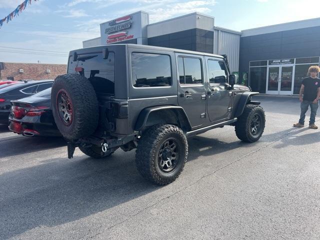 used 2014 Jeep Wrangler Unlimited car, priced at $16,558