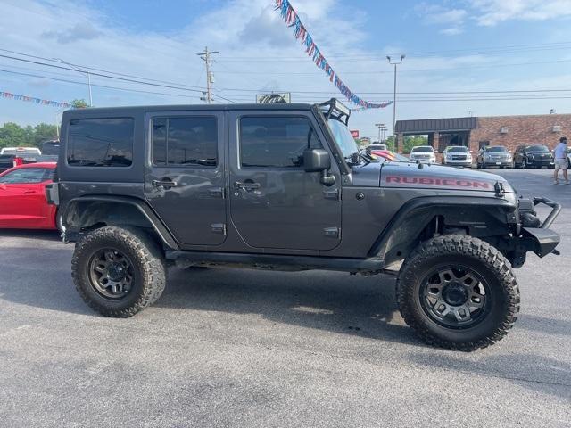 used 2014 Jeep Wrangler Unlimited car, priced at $16,558