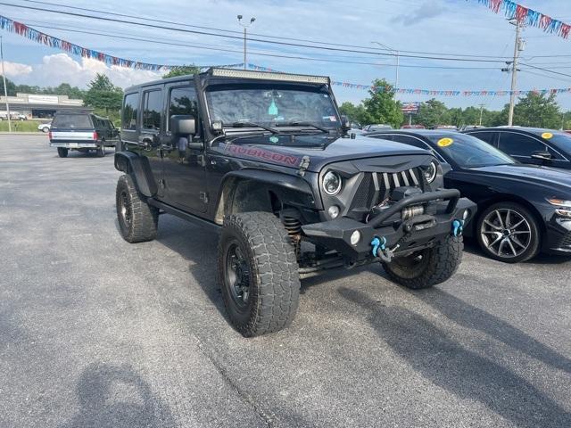 used 2014 Jeep Wrangler Unlimited car, priced at $16,558