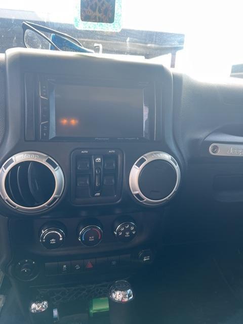 used 2014 Jeep Wrangler Unlimited car, priced at $16,558