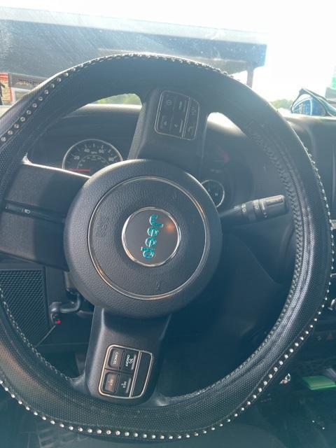 used 2014 Jeep Wrangler Unlimited car, priced at $16,558