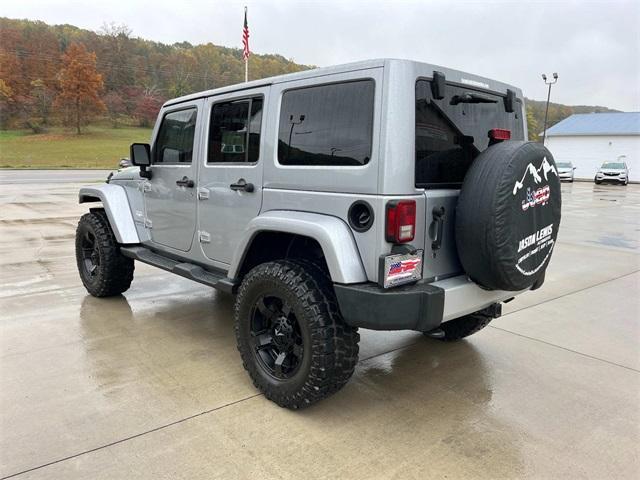 used 2013 Jeep Wrangler Unlimited car, priced at $16,039