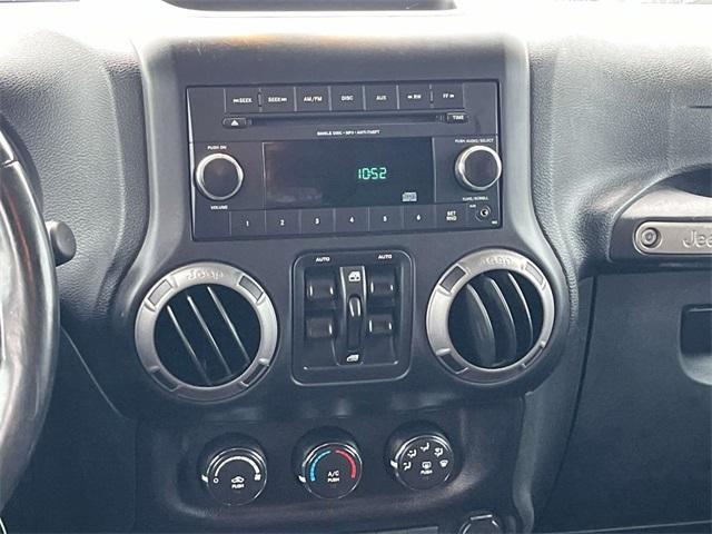 used 2015 Jeep Wrangler Unlimited car, priced at $18,054