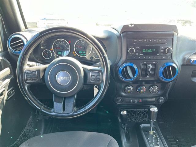 used 2015 Jeep Wrangler Unlimited car, priced at $21,195