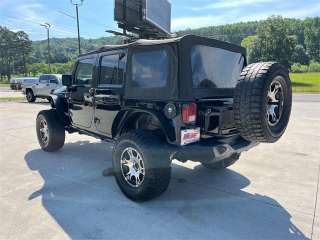 used 2015 Jeep Wrangler Unlimited car, priced at $21,195