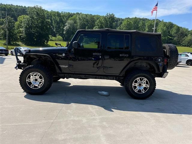 used 2015 Jeep Wrangler Unlimited car, priced at $21,195