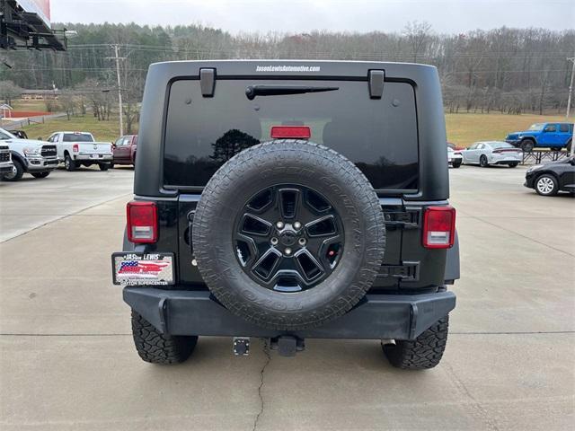 used 2015 Jeep Wrangler Unlimited car, priced at $23,900