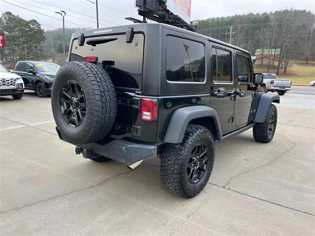 used 2015 Jeep Wrangler Unlimited car, priced at $23,900