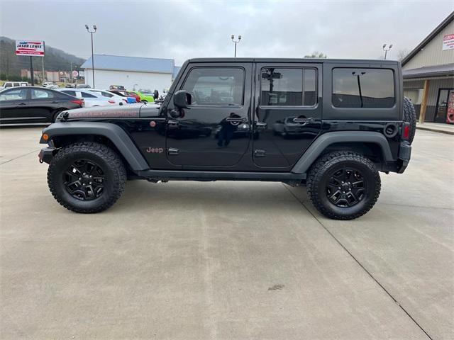 used 2015 Jeep Wrangler Unlimited car, priced at $23,900