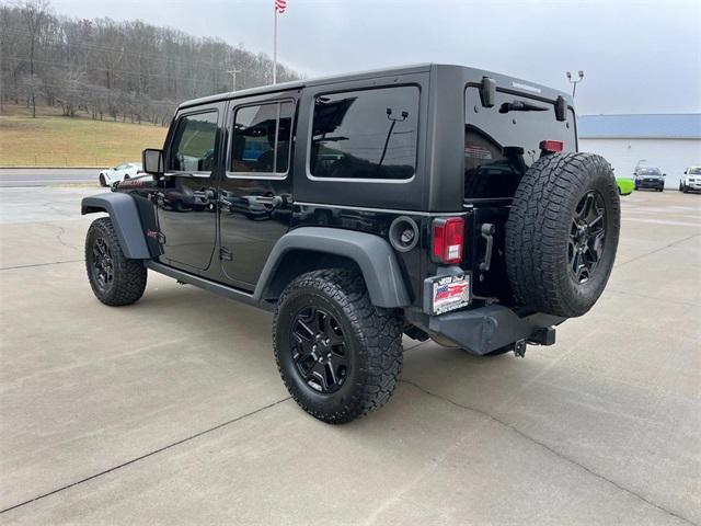 used 2015 Jeep Wrangler Unlimited car, priced at $23,900