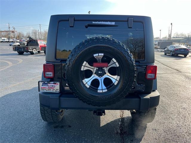 used 2011 Jeep Wrangler Unlimited car, priced at $15,235