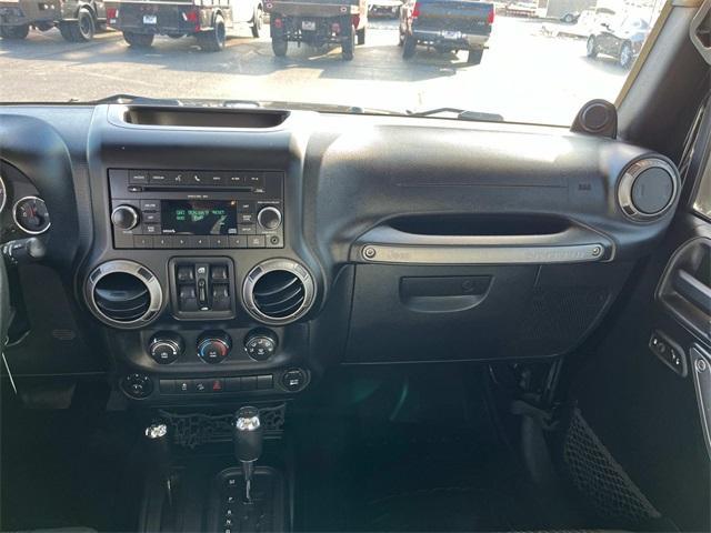 used 2011 Jeep Wrangler Unlimited car, priced at $15,235