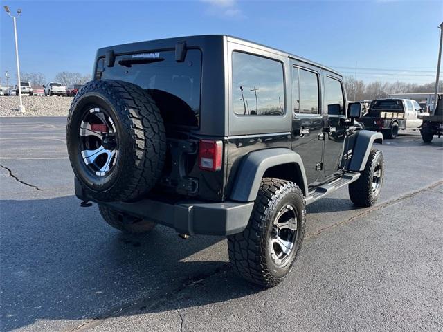 used 2011 Jeep Wrangler Unlimited car, priced at $15,235